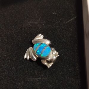 Charming Silver Frog Brooch with Blue and Green Accents